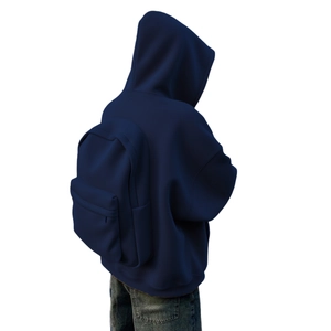 Rear view of navy oversized hoodie paired with a matching minimalist backpack and denim
