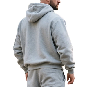 Rear view of heavy grey fleece-lined hooded sweatshirt and matching jogger pants set