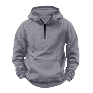 Detail of grey men's hoodie featuring a 1/4 zipper, drawstring hood, and kangaroo pocket