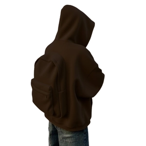 Rear view of oversized dark brown zip-up hoodie paired with matching backpack