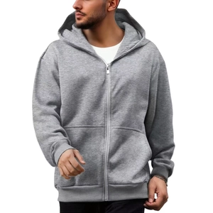 Detailed view of grey zip-up hoodie featuring a drawstring hood and split kangaroo pocket