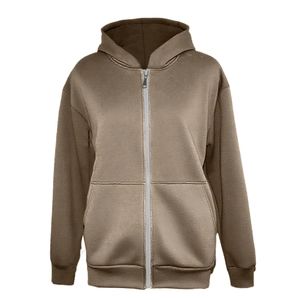 Detail of heavyweight brown zip-up hoodie showing fleece lining and pocket texture