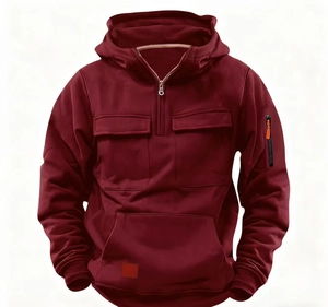 Detail view of burgundy tactical hoodie featuring half-zip collar and cargo chest pockets