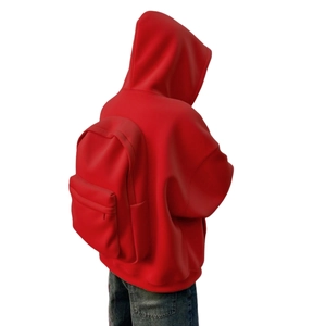 Rear view of red loose-fit hoodie and matching backpack with front zipper pocket