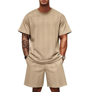 Detailed view of men's beige cable knit textured short sleeve tee and shorts set