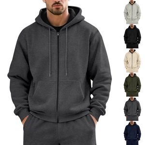 Detailed close-up showing texture of men's fleece-lined zip-up hoodie and drawstring hood
