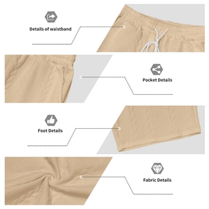Detail view of khaki knit shorts with waffle texture, drawstring waist and pocket details