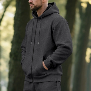 Detail of grey heather fleece zip-up hoodie with adjustable drawstring and ribbed cuffs