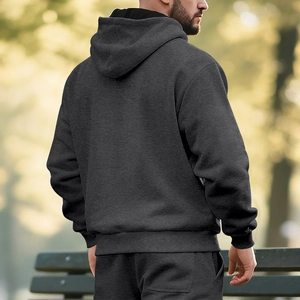 Detail of premium fleece-lined hooded sweatshirt with ribbed cuffs and textured fabric