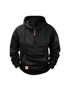 Men's black tactical hoodie with orange zipper pulls and honeycomb texture fabric