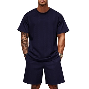 Detail of navy blue jacquard knit texture on men's summer short sleeve t-shirt and shorts set