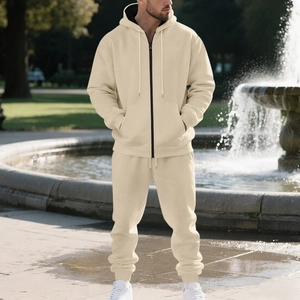 Detailed close-up of beige men's hooded tracksuit with zipper and drawstring details