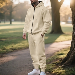 Outdoor shot of men heavy plain beige fleece tracksuit with zip-up hoodie and joggers