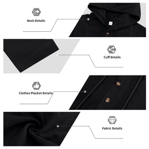 Detailed close-up of men's black linen hoodie showing fabric texture and wooden buttons
