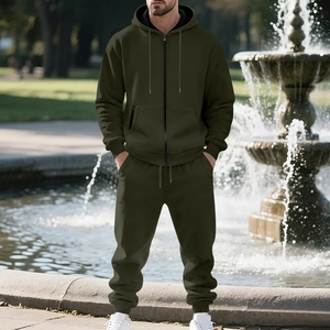 Detail shot of men's dark green fleece-lined hooded tracksuit with zipper and drawstring