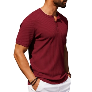 Detail of burgundy ribbed texture and buttoned Henley neckline on men's short sleeve shirt