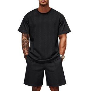 Detail shot of men's casual black knit waffle texture short sleeve T-shirt and shorts set