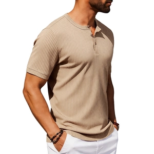 Close-up of khaki ribbed texture and buttoned placket on men's short sleeve Henley shirt