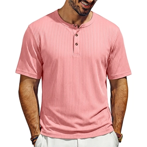 Detail of pink Henley shirt featuring ribbed knit texture and three-button wooden neckline