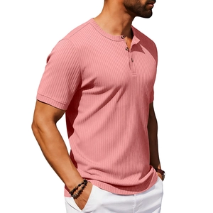Detail of pink ribbed knit Henley shirt with buttoned collar and soft elastic texture