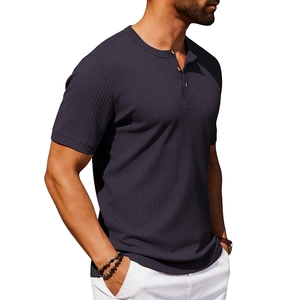 Detail of dark grey men's Henley shirt with vertical ribbed texture and button neckline