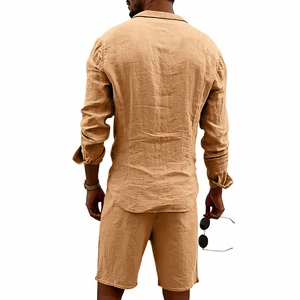 Rear view of khaki linen two-piece set featuring long sleeve shirt and elastic waist shorts