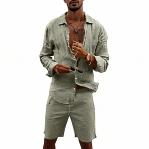 Detail view of sage green men's linen set featuring long-sleeve shirt and drawstring shorts