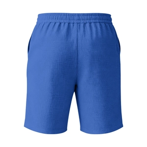 Détail du tissu gaufré bleu roi et de la taille élastique à cordon de ce short décontracté
