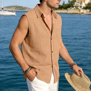 Detail of khaki linen sleeveless shirt showing breathable fabric texture and pocket