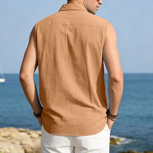Detailed back view of a men's sleeveless khaki linen shirt with a vacation seaside backdrop
