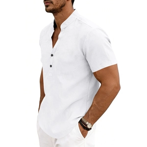 Detail of white linen Henley shirt featuring a stand collar and black contrast buttons