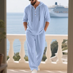 Detail of light blue linen blend set with hooded henley shirt and drawstring trousers