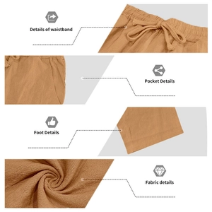 Dettaglio dei pantaloni in lino marrone da uomo con coulisse in vita e texture del tessuto