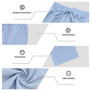 Detailed views of light blue linen trousers with drawstring waist and side pockets