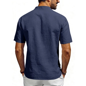 Detail view of navy linen shirt back texture and mandarin collar on male model