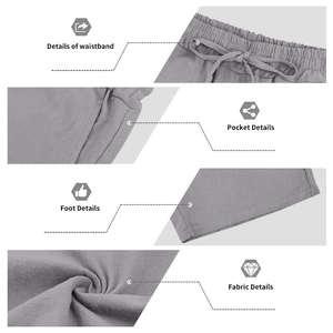 Detail of grey linen shorts featuring drawstring elastic waistband and side pockets
