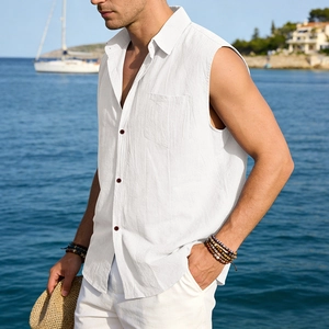 Close-up of white sleeveless linen shirt featuring breathable texture and chest pocket
