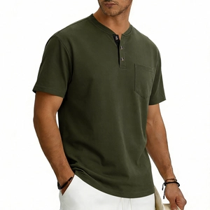 Detail of dark green Henley shirt featuring a three-button placket and a chest pocket