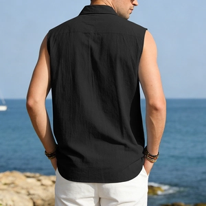 Rear view of a men's black sleeveless linen shirt with a lapel collar at the beach