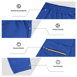 Detail view showing elastic waistband with drawstring and zip pockets on blue cargo pants