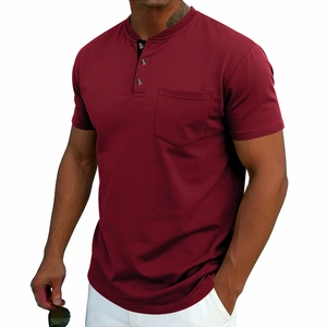 Detailed macro of the burgundy Henley neck shirt with buttons and chest pocket texture