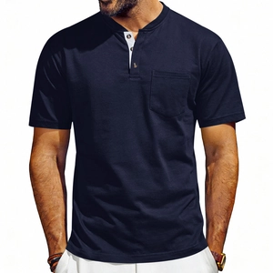 Close-up of contrast white placket and pocket on deep blue cotton Henley shirt