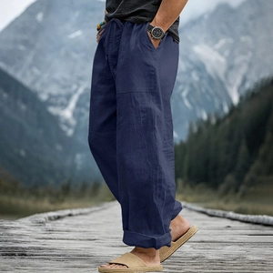 Deep blue linen casual trousers for men featuring elastic drawstring waist and side pockets