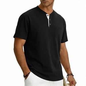 Detail of men's Henley T-shirt with contrast placket, chest pocket, and wooden buttons