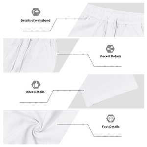 Detail view of white linen pants featuring drawstring waist and practical side pockets