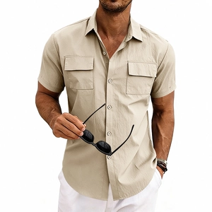 Detail view of men's beige short sleeve shirt with functional double chest pockets