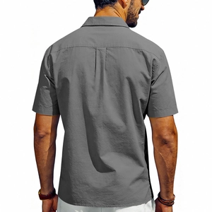 Rear view of grey men's short sleeve shirt showing back pleats and fabric texture