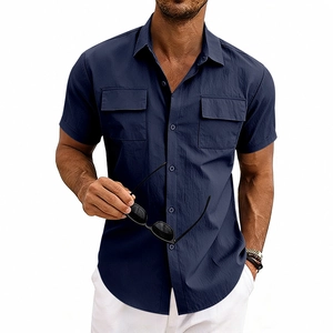 Detail of navy blue cargo shirt featuring textured fabric and symmetrical chest pockets