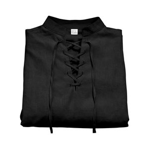 Detail of black linen shirt showing lace-up V-neck and 95% linen material label