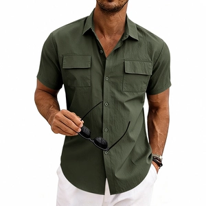 Close-up of military green short-sleeve shirt featuring dual chest pockets and flap collar